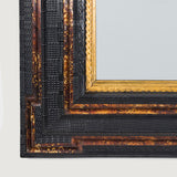 A square mirror in the 17th century style, with alternate ebonised and tortoiseshell sections.