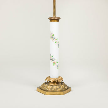 A 19th century brass and opaline column lamp-base painted with twisting convolvulus, now electrified.