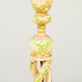 A green and cream lacquer Kashmiri candle-stick, 20th century, wired as a lamp.