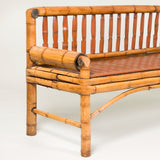 An unusual hall bench made from bent large-gauge sections of bamboo and a split bamboo seat. 20th century.