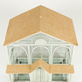 A painted wooden birdcage in the form of a gabled pavilion, 20th century.