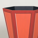 A hexagonal waste paper bin with hand painted faux panel decoration. Paint chart colour No. 13.