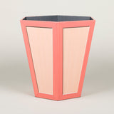 A hexagonal waste paper bin with hand painted faux panel decoration. Paint chart colour No. 5.