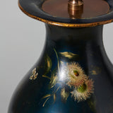 A papier-mache vase with floral decoration on a black ground, by Jennings and Bettridge, c. 1840, as a lamp.