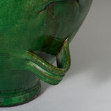 An unusual four-handles green glazed pottery vase, probably French, 20th C. wired as a lamp.