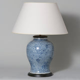 An 18th or early 19th C. Chinese baluster vase with all-over blue and white floral decoration, as a lamp.