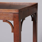 An 18th century rectangular table the mahogany base c.1760 made to support the earlier kingwood oyster-veneered top.