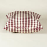 A pair of 21” square cushions made up in a lilac silk check fabric.