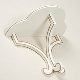 A SIMPLE PAINTED WOODEN WALL BRACKET WITH ADDED LINE DETAIL
