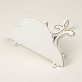 A SIMPLE PAINTED WOODEN WALL BRACKET WITH ADDED LINE DETAIL