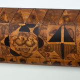 A small rectangular mirror with an intricate burr wood marquetry cushion frame and bevelled plate. 19th C.