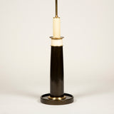 A mid-20th century French column lamp on a wide round base covered in bronze coloured leather, rewired.