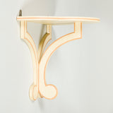 A SIMPLE PAINTED WOODEN WALL BRACKET WITH ADDED LINE DETAIL