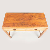 A walnut side table by Peter Waals, mid 20th century.