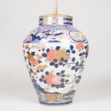 A very fine large Japanese Imari vase decorated with flowering leafy branches, circa 1680, adapted as a lamp.