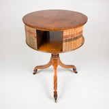 A small mahogany drum table with revolving book case top and tripod base. Circa 1800, a lovely golden colour.