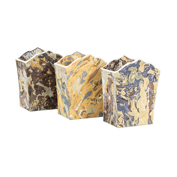 A FINE CARTONNAGE PENCIL HOLDER IN MARBLEISED PAPERS.