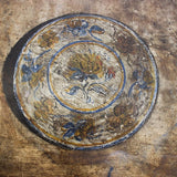 A 1960s/1970s SPANISH SIDE TABLE WITH A GILT METAL BASE AND LATER PAINTED DECORATION TO THE TOP.