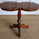 A STRIKING 19TH FRENCH WALNUT OCCASIONAL TABLE WITH TWIN-LOBED TOP AND CARVED PEDESTAL BASE.