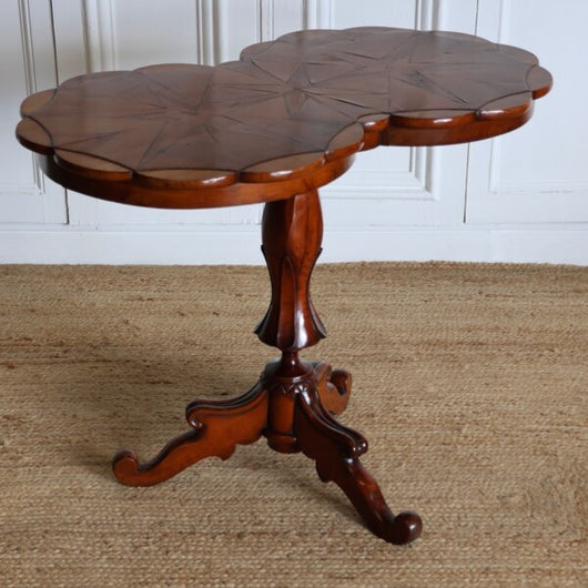 A STRIKING 19TH FRENCH WALNUT OCCASIONAL TABLE WITH TWIN-LOBED TOP AND CARVED PEDESTAL BASE.