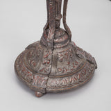 AN ELABORATELY CARVED LAMP BASE WITH A PAINTED BRONZE FINISH, PROBABLY LATE 19TH CENTURY, REWIRED.