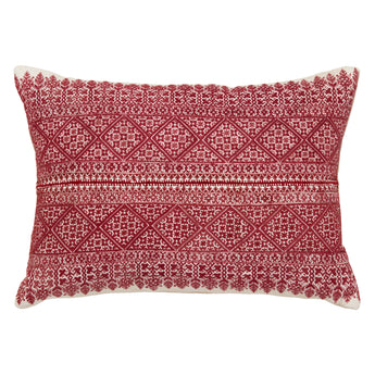A RECTANGULAR CUSHION MADE UP FROM A PANEL OF ANTIQUE FEZ WEAVE FABRIC AND BACKED WITH  ANTIQUE FRENCH LINEN.