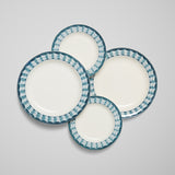 A COLLECTION OF BLUE LAG AND FEATHER WEDGWOOD CREAMWARE, MID-19TH CENTURY. CONSISTING OF 22 PLATES OF VARYING SIZES AND TWO TUREENS.