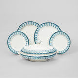 A COLLECTION OF BLUE LAG AND FEATHER WEDGWOOD CREAMWARE, MID-19TH CENTURY. CONSISTING OF 22 PLATES OF VARYING SIZES AND TWO TUREENS.