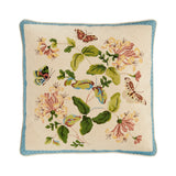 A PAIR OF VINTAGE COLEFAX AND FOWLER EMBROIDERED HONEYSUCKLE CUSHIONS BACKED IN A YELLOW LINEN.