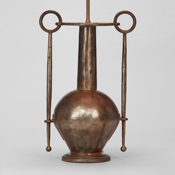 A LARGE METAL VASE WITH A TALL NECK, BULBOUS BASE AND ARMS TERMINATING IN RING HANDLES, WIRED AS A LAMP. 20TH CENTURY.
