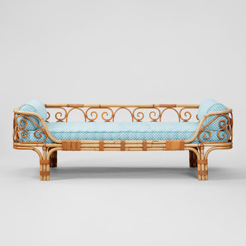 A BONACINA RATTAN AND BAMBOO DAYBED. UPHOLSTERED IN THE FLEURETTE LIGHT BLUE FABRIC. ITALIAN MID-20TH CENTURY.