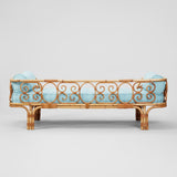 A BONACINA RATTAN AND BAMBOO DAYBED. UPHOLSTERED IN THE FLEURETTE LIGHT BLUE FABRIC. ITALIAN MID-20TH CENTURY.
