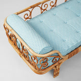 A BONACINA RATTAN AND BAMBOO DAYBED. UPHOLSTERED IN THE FLEURETTE LIGHT BLUE FABRIC. ITALIAN MID-20TH CENTURY.