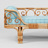 A BONACINA RATTAN AND BAMBOO DAYBED. UPHOLSTERED IN THE FLEURETTE LIGHT BLUE FABRIC. ITALIAN MID-20TH CENTURY.
