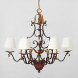 A LARGE SIX-BRANCH 19TH CENTURY FRENCH WROUGHT IRON CHANDELIER WITH PAINTED AND GILDED ELEMENTS, REWIRED.