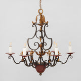 A LARGE SIX-BRANCH 19TH CENTURY FRENCH WROUGHT IRON CHANDELIER WITH PAINTED AND GILDED ELEMENTS, REWIRED.