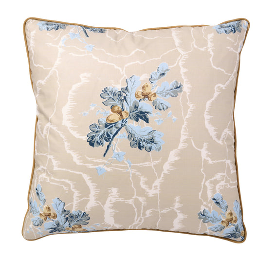 A SQUARE CUSHION MADE UP IN THE HASELEY ACORN CHINTZ CONTRAST PIPED IN BEIGE.