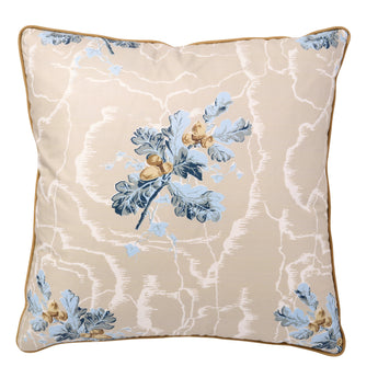 A  SQUARE CUSHION MADE UP IN THE HASELEY ACORN CHINTZ FINISHED CONTRAST PIPED.