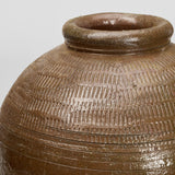 A PAIR OF OLIVE GREEN GLAZED POTTERY VASES.