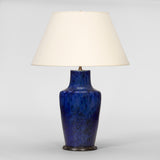 A PAIR OF LATE 20TH CENTURY VASES WITH A DARK BLUE MOTTLED GLAZE, WIRED AS LAMPS.