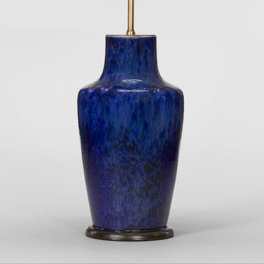 A PAIR OF LATE 20TH CENTURY VASES WITH A DARK BLUE MOTTLED GLAZE, WIRED AS LAMPS.