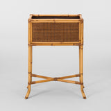A MID-20TH C. RECTANGULAR BAMBOO AND RATTAN PLANT STAND.