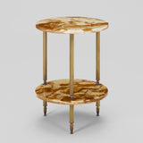 A ROUND TWO-TIER ONYX TABLE WITH REEDED BRASS UPRIGHTS. 1950'S FRENCH.