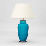 A PAIR OF FRENCH POTTERY VASES IN A DEEP TURQUISE GLAZE, MID-20TH CENTURY, WIRED AS LAMPS.
