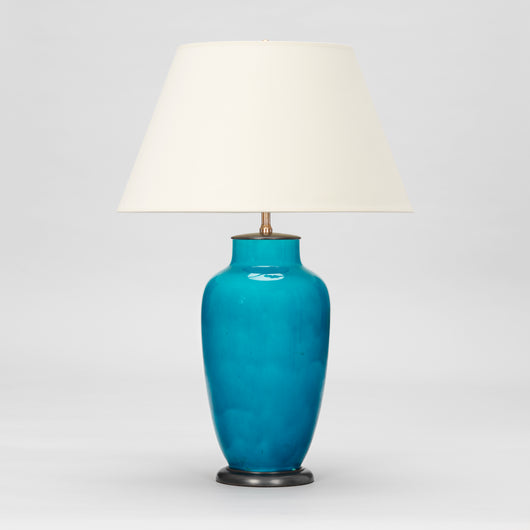 A PAIR OF FRENCH POTTERY VASES IN A DEEP TURQUISE GLAZE, MID-20TH CENTURY, WIRED AS LAMPS.