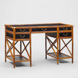 A 1950s BAMBOO FRAMED DESK WITH EBONISED RATTAN PANELS AND PAIRS OF DRAWERS SET ABOVE SHELVES.