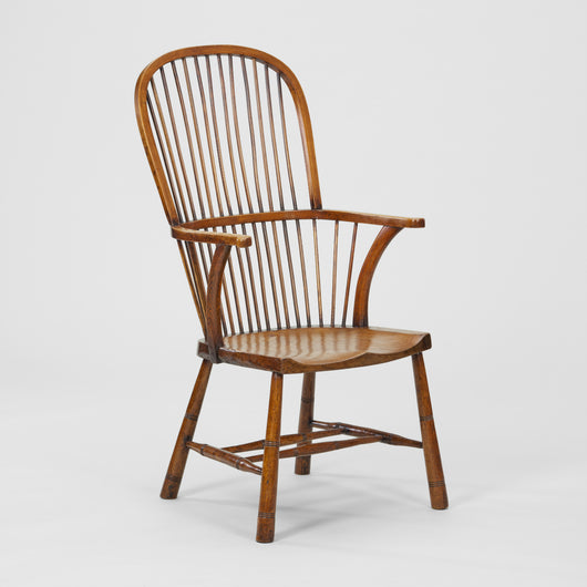 A LATE 19TH CENTURY OAK AND ELMWOOD WINDSOR CHAIR OF LARGE SCALE.