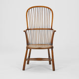 A LATE 19TH CENTURY OAK AND ELMWOOD WINDSOR CHAIR OF LARGE SCALE.