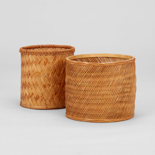TWO ROUND JAPANESE WOVEN RATTAN BASKETS.