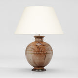 AN ART POTTERY VASE BY W.A. WELLOWAY IN THE JAPANESE TASTE, OF SPHERICAL SHAPE WITH BROWN MARKINGS TO THE RIBBED BODY. DATED 1947. WIRED AS A LAMP.